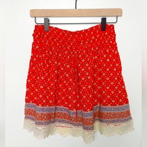 Red skirt with lace and small flowers